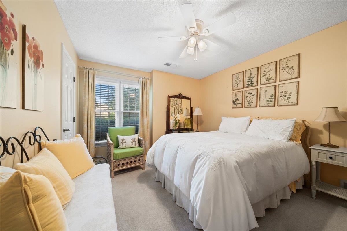 1880 Newfields Road Germantown, TN 38139 - Photo 25 of 34 Bedroom with carpet, a textured ceiling, and ceiling fan