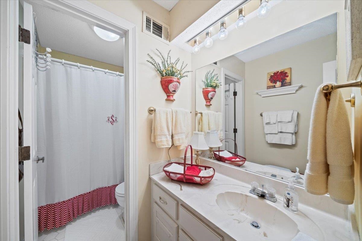 1880 Newfields Road Germantown, TN 38139 - Photo 26 of 34 Bathroom featuring vanity and toilet