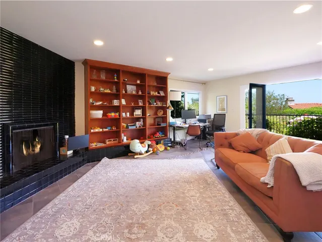 a room with toys and a book shelf