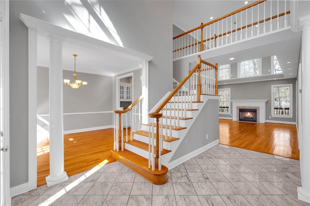 204 Red Maple Way Clemson, SC 29631 - Photo 48 of 48 This grand foyer showcases elegant stairs and a beautiful open floorplan, perfect for welcoming guests.