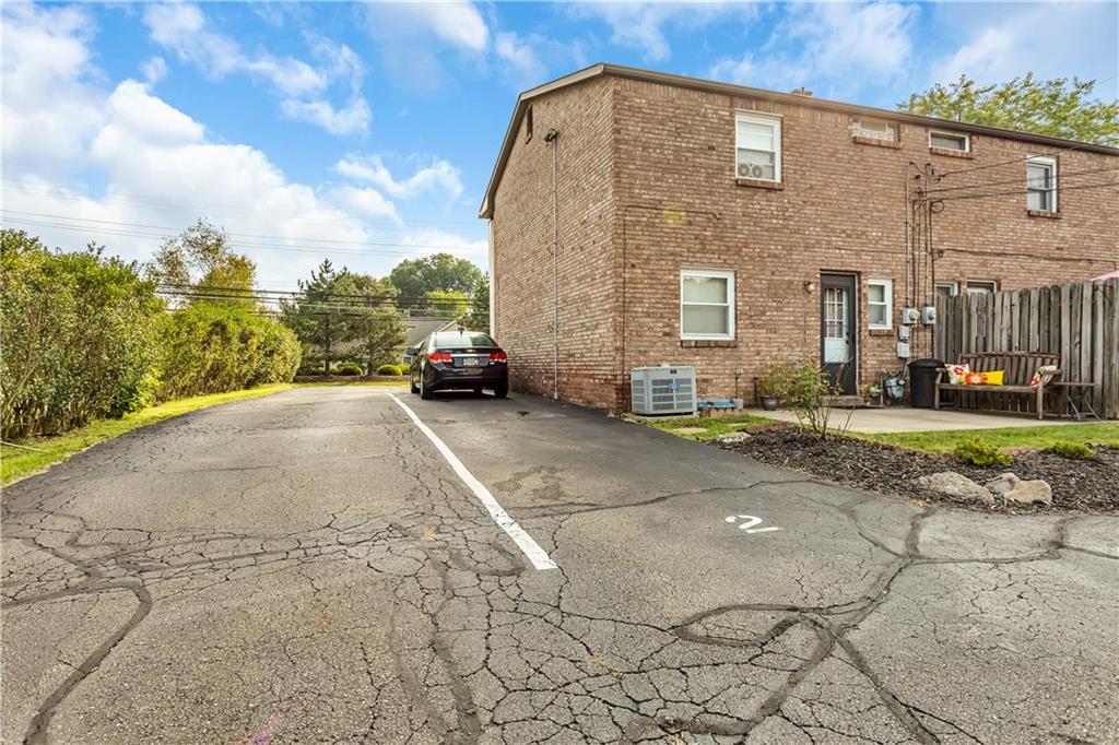 1685 Brodhead Road, Unit 2 Coraopolis, PA 15108 - Photo 24 of 25 2 designated parking spaces right beside the unit. There is a visitor space in the front lot just behind the unit and more spaces in the lot in the back for visitors.