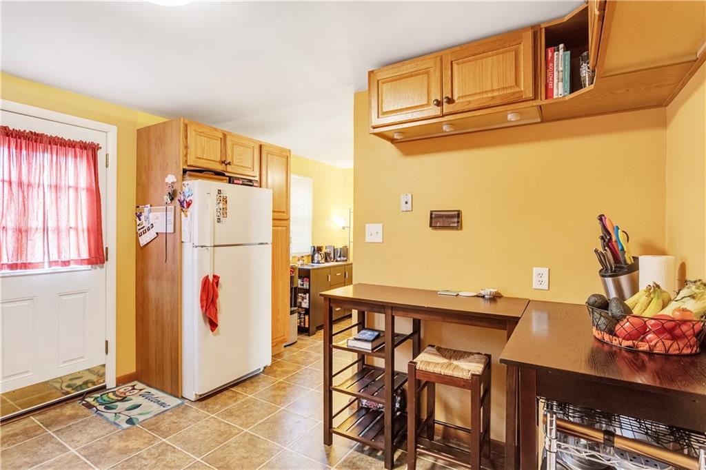 1685 Brodhead Road, Unit 2 Coraopolis, PA 15108 - Photo 8 of 25 Kitchen is located right inside the back door from the patio. Convenient when bringing groceries from the car!