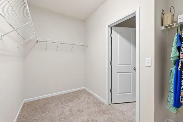 a view of an empty walk in closet