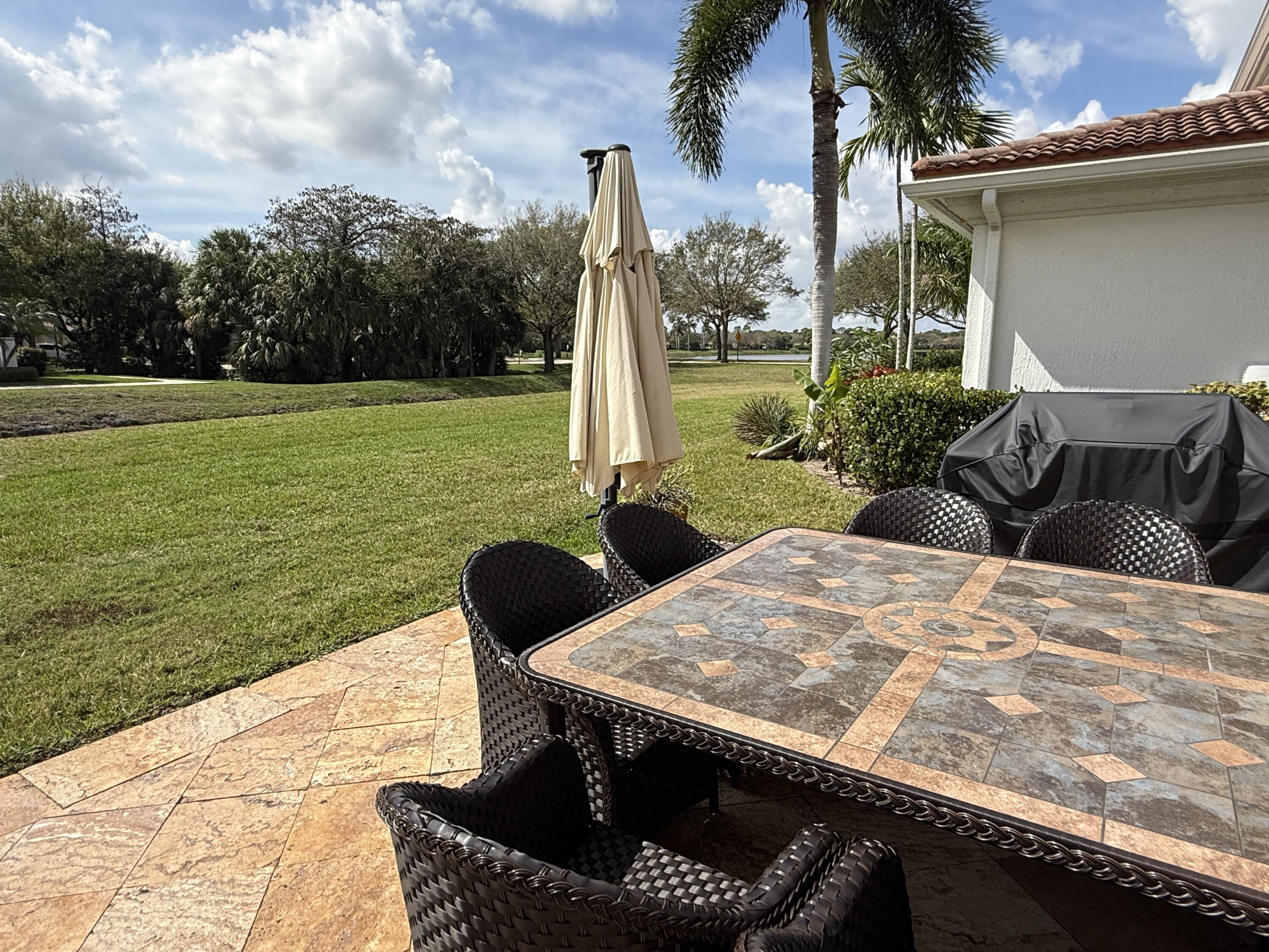 706 Duchess Court Palm Beach Gardens, FL 33410 - Photo 23 of 61 lake in the distance