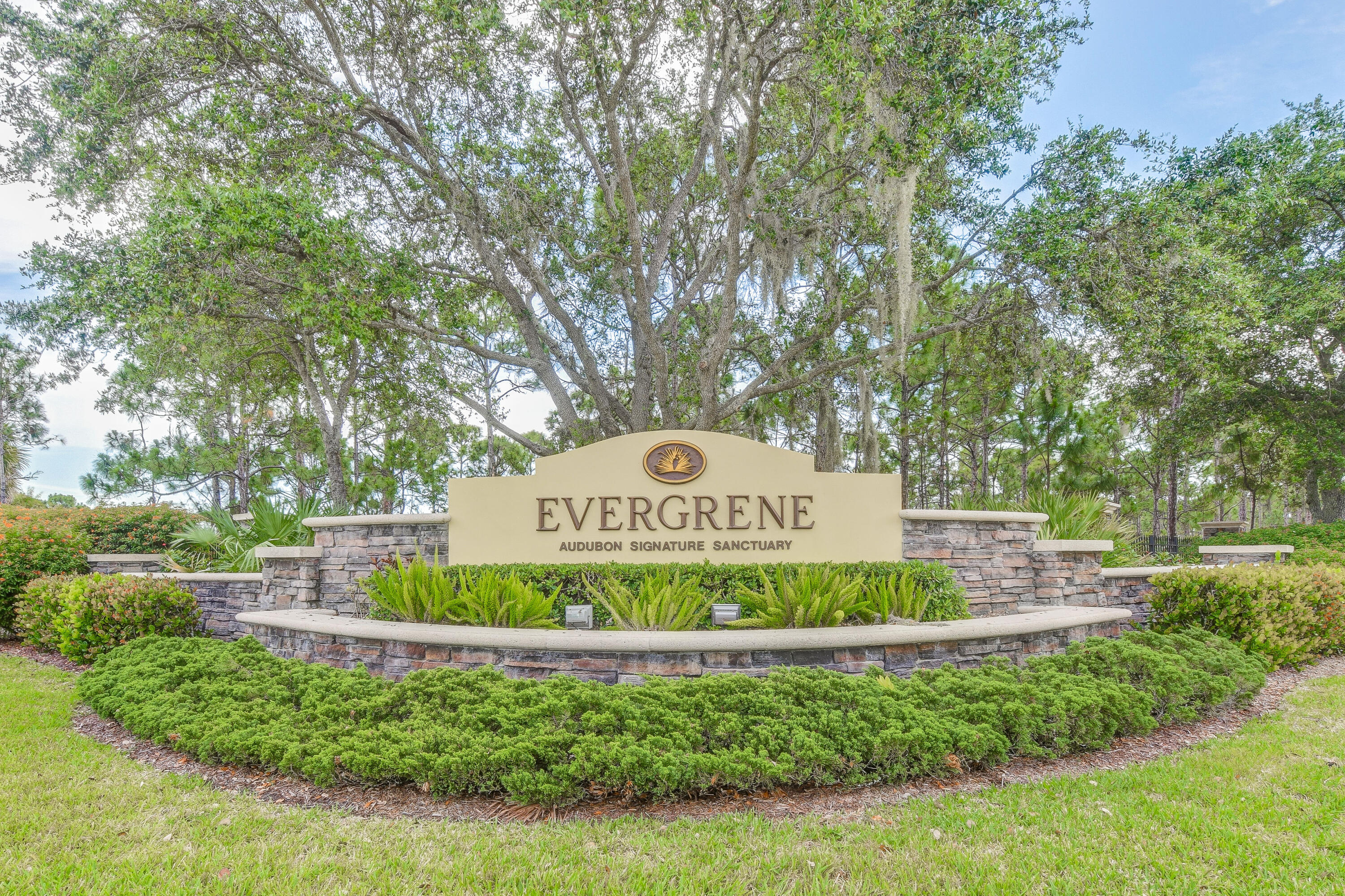 706 Duchess Court Palm Beach Gardens, FL 33410 - Photo 26 of 61 a sign on the side of a road