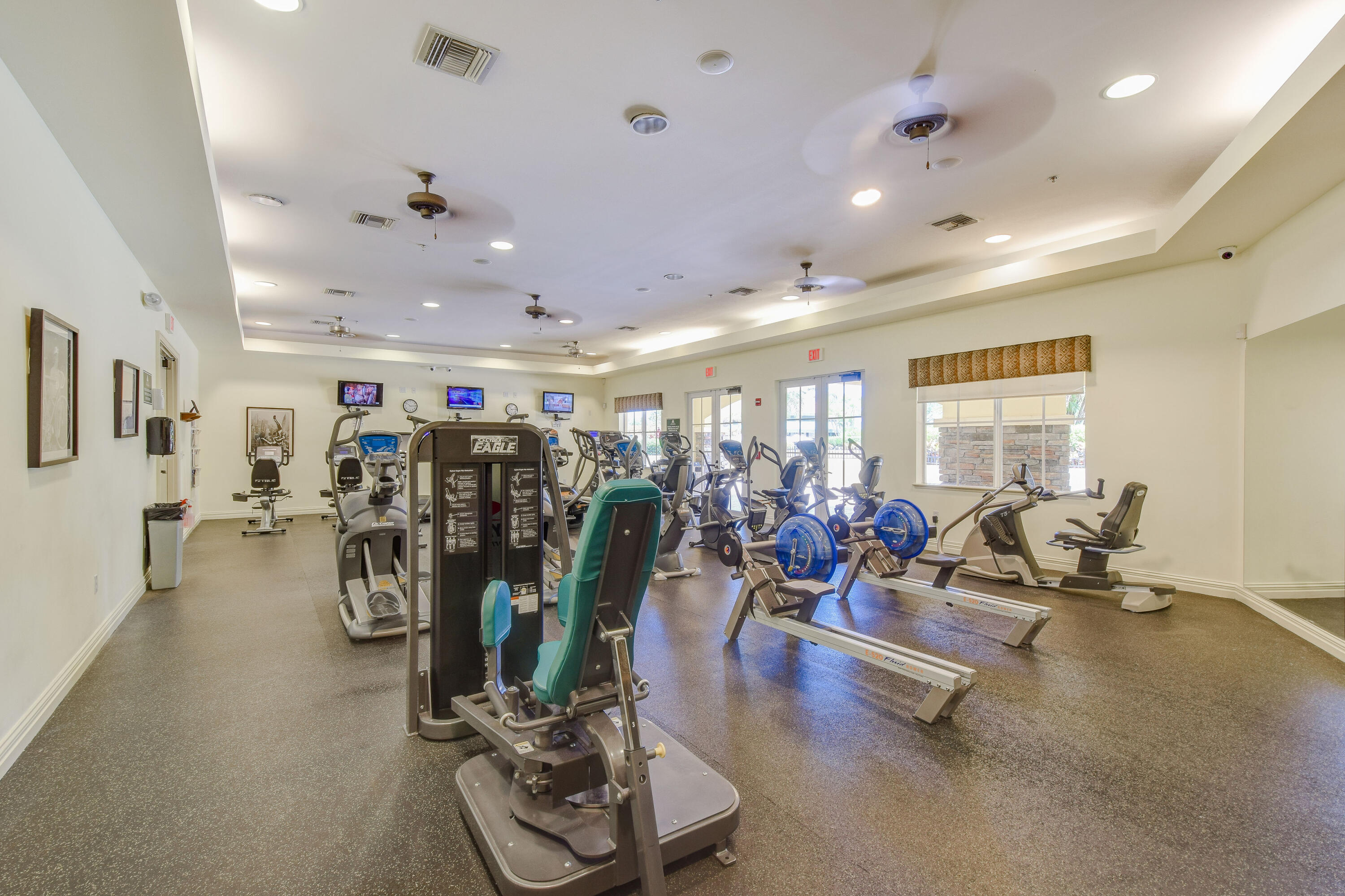 706 Duchess Court Palm Beach Gardens, FL 33410 - Photo 31 of 61 a view of a room with gym equipment