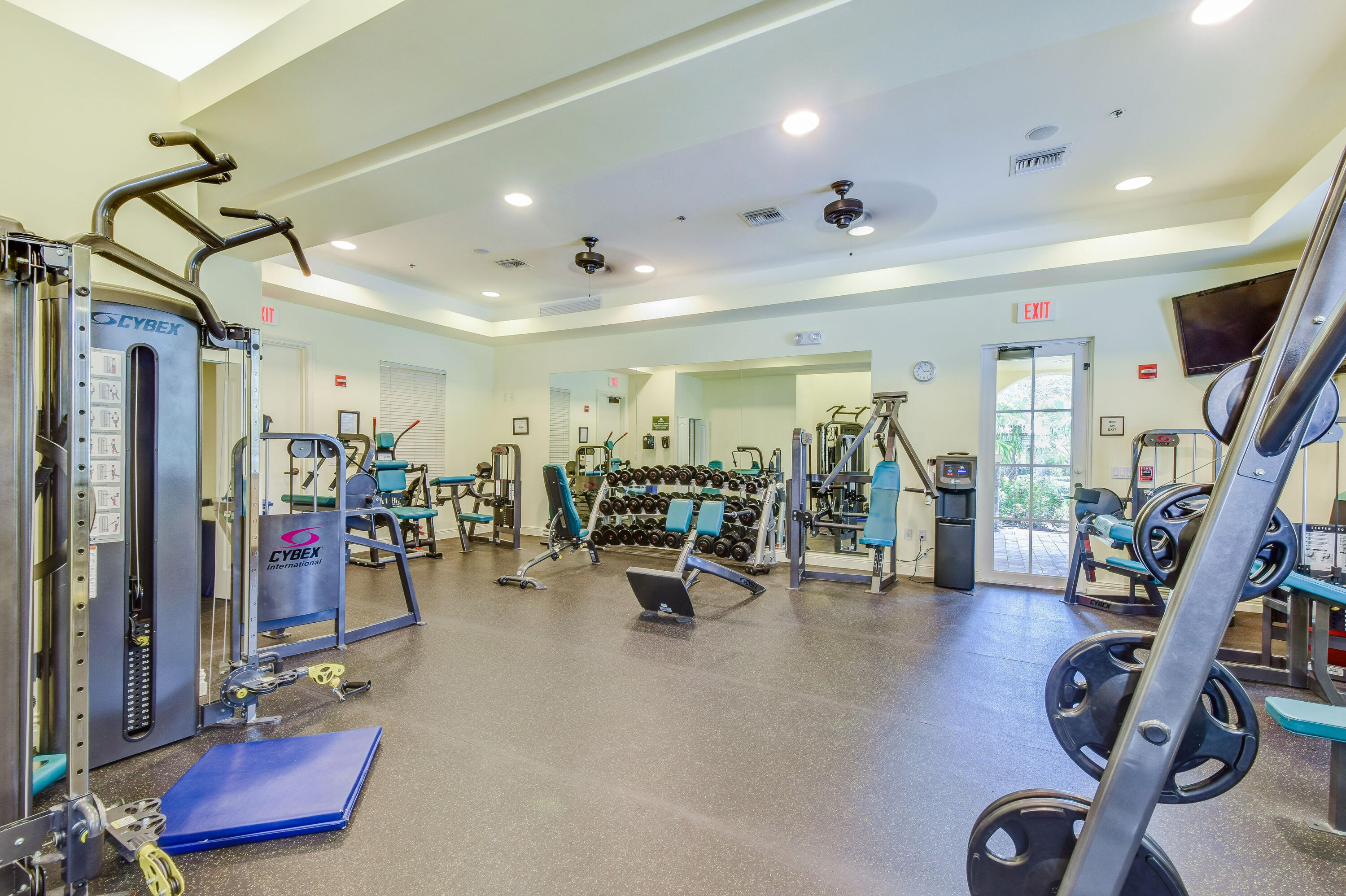 706 Duchess Court Palm Beach Gardens, FL 33410 - Photo 35 of 61 a view of a room with gym equipment