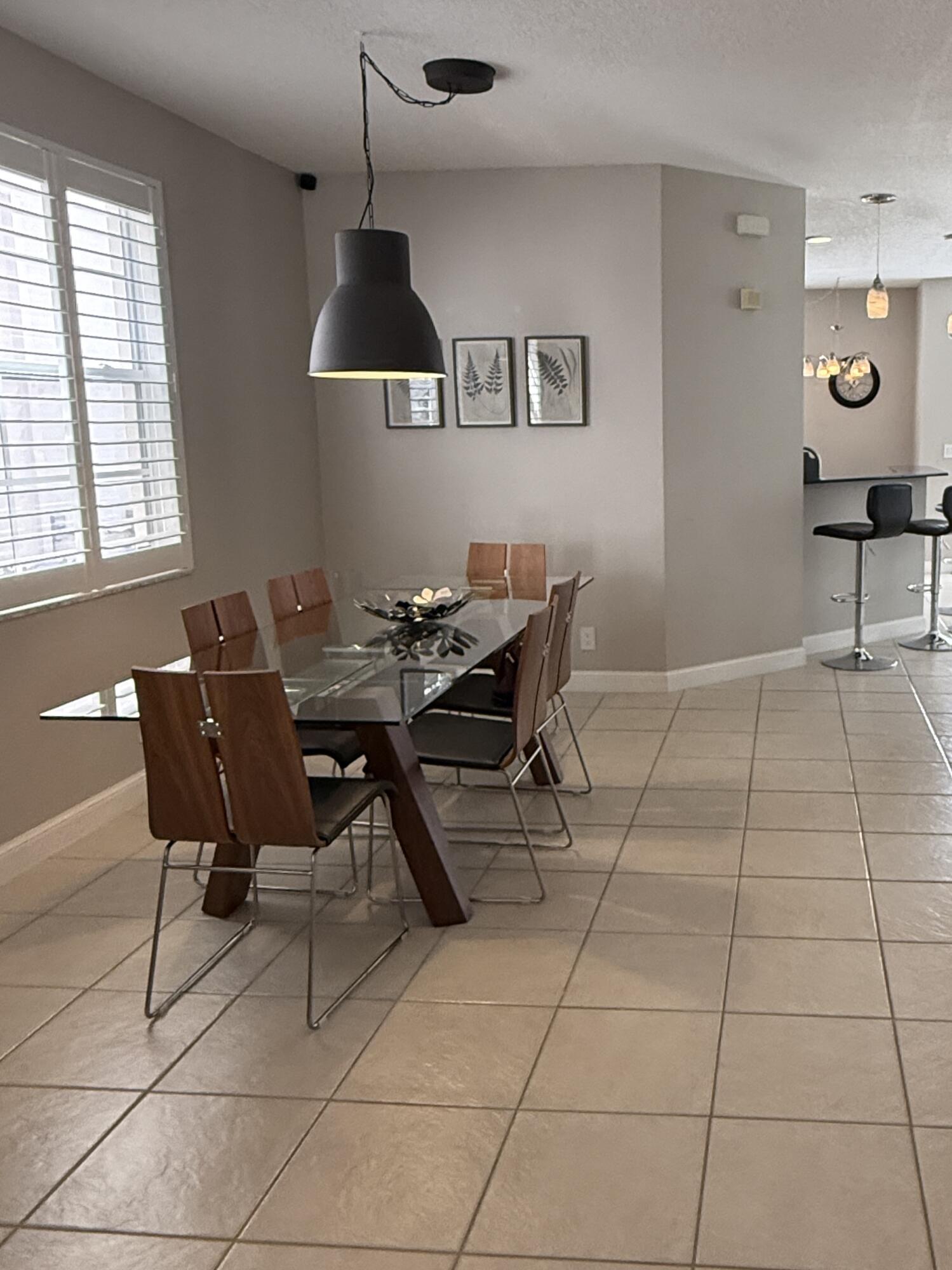 706 Duchess Court Palm Beach Gardens, FL 33410 - Photo 4 of 61 Dining Area