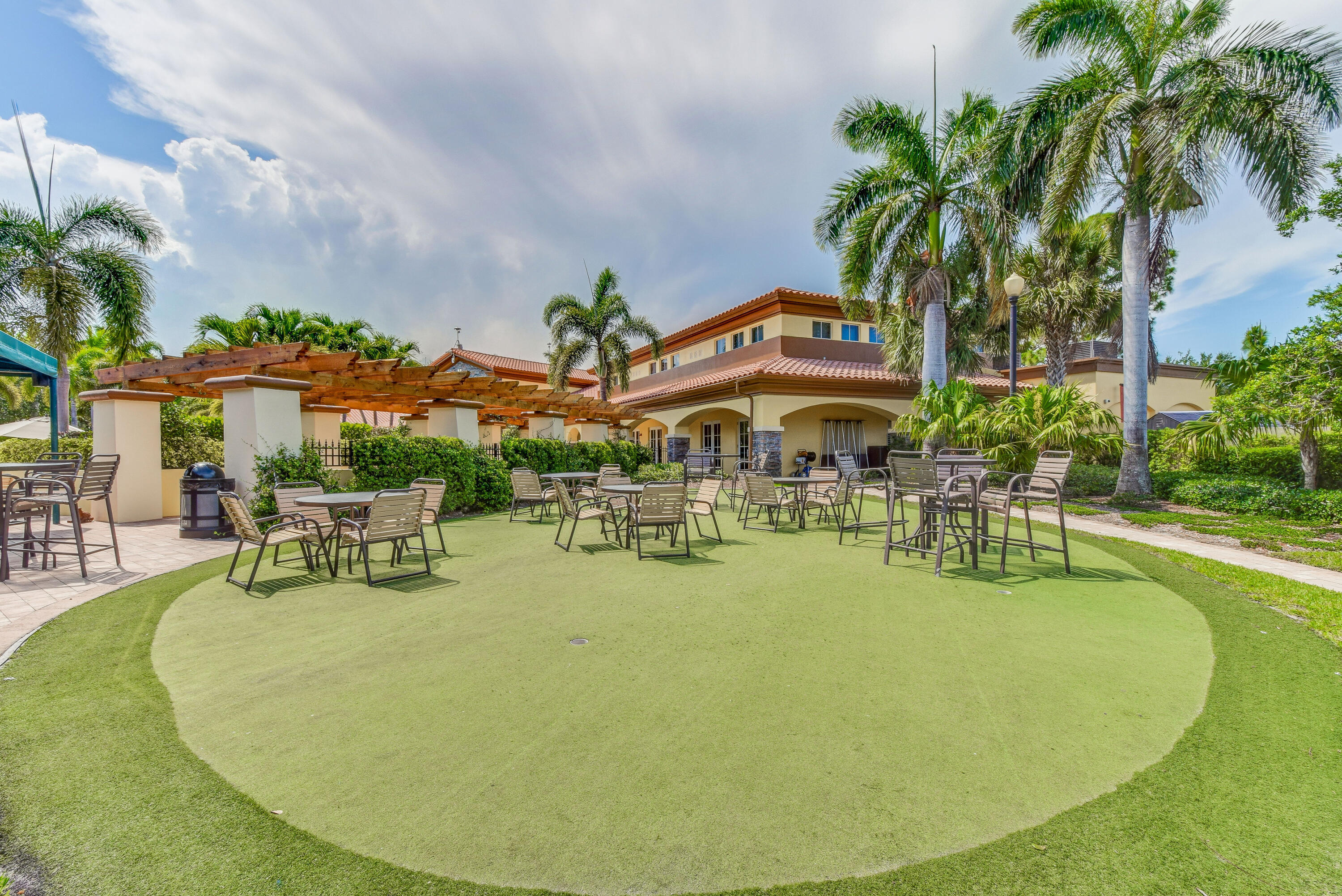 706 Duchess Court Palm Beach Gardens, FL 33410 - Photo 45 of 61 an outdoor space with swimming pool and patio