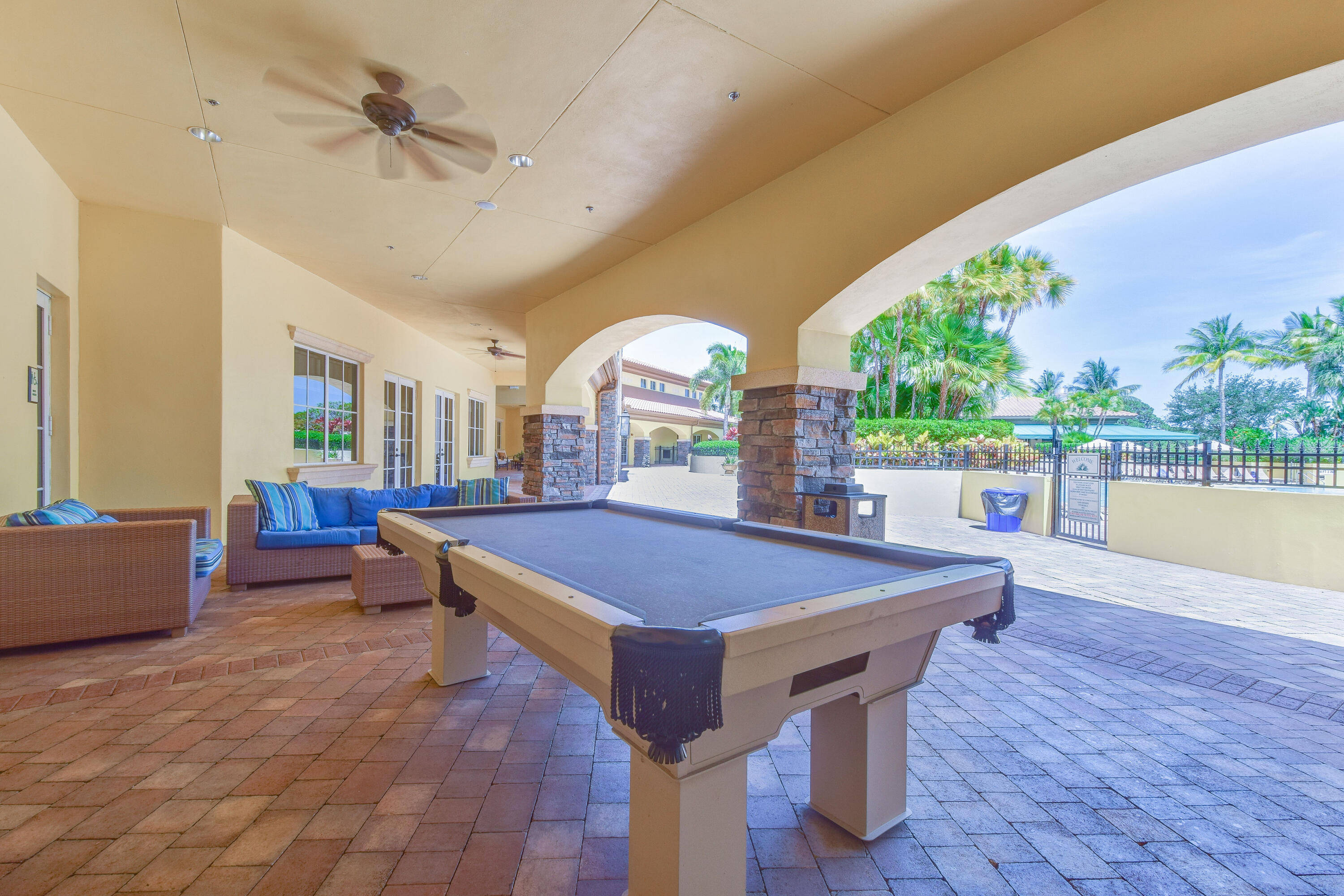 706 Duchess Court Palm Beach Gardens, FL 33410 - Photo 49 of 61 a room with pool table and windows