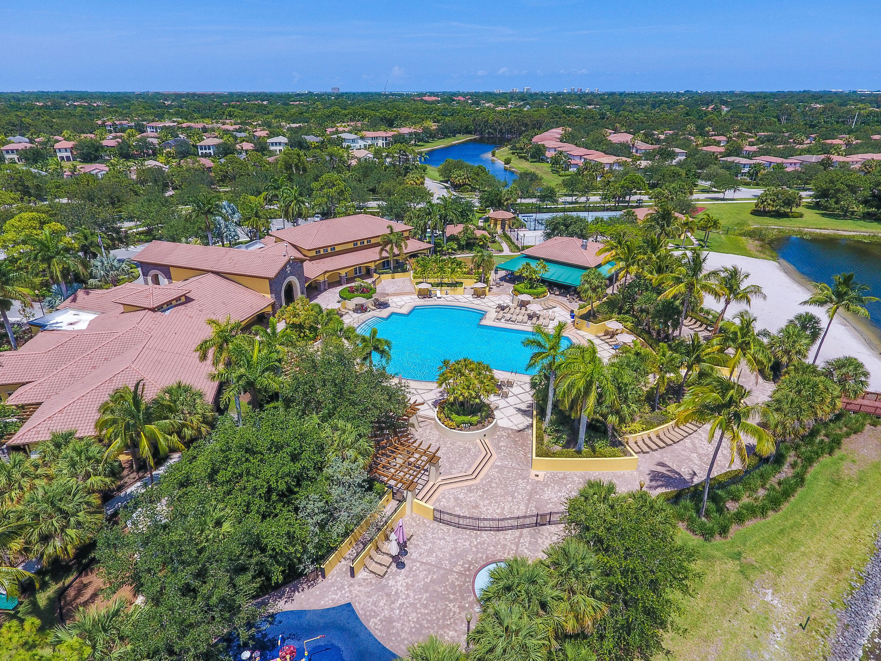 706 Duchess Court Palm Beach Gardens, FL 33410 - Photo 59 of 61 an aerial view of residential houses with outdoor space and swimming pool