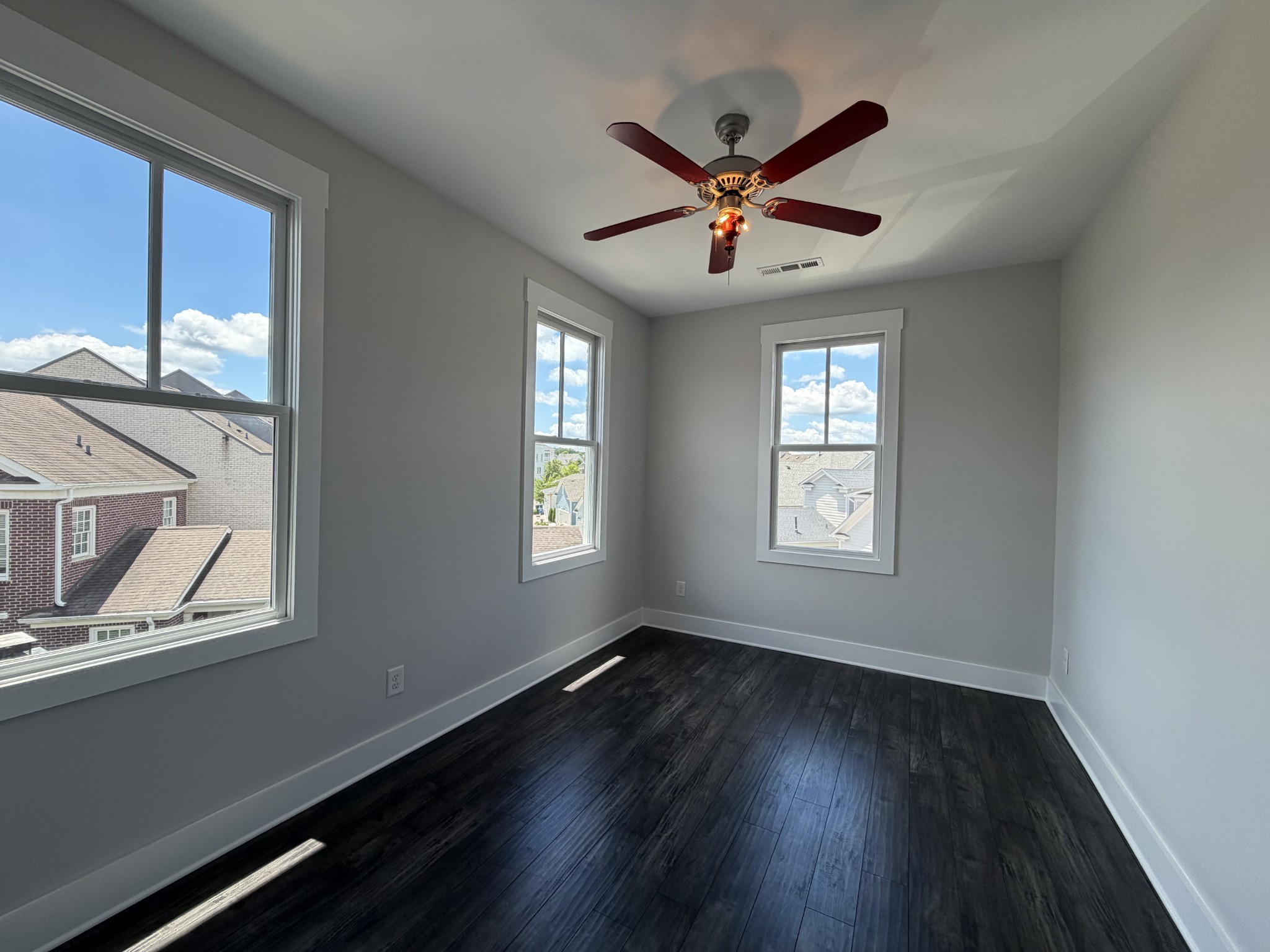 3097 Rural Plains Circle Franklin, TN 37064 - Photo 19 of 28 a view of a big room with wooden floor closet and windows