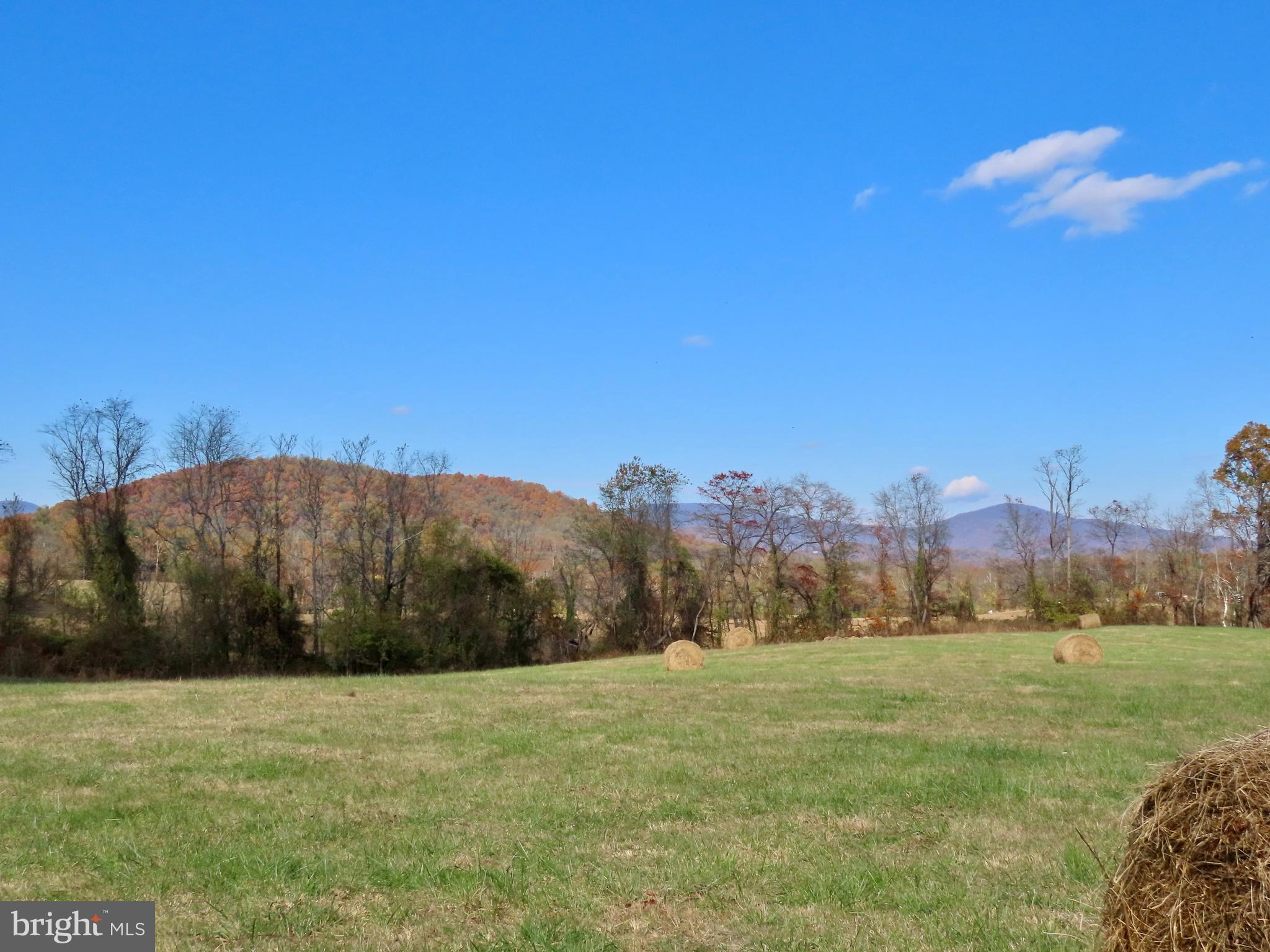 419 Rudasill Mill Road Woodville, VA 22749 - Photo 38 of 42 Hay field w/ Red Oak Mtn backdrop