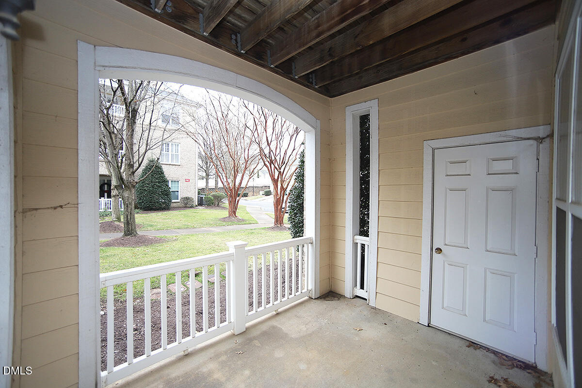 3161 Hemlock Forest Circle, Unit 101 Raleigh, NC 27612 - Photo 19 of 21 a view of a porch
