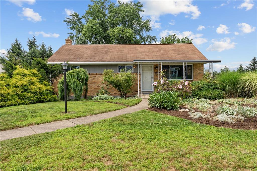 453 Marzolf Road Pittsburgh, PA 15209 - Photo 1 of 44 a view of a house with a yard