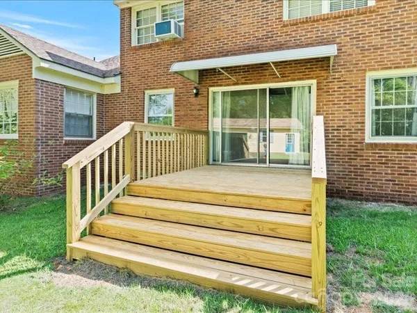 a view of backyard with deck