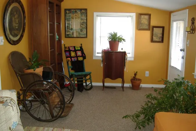 a room with furniture and a mirror