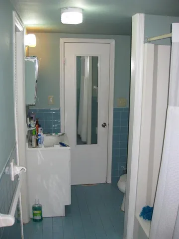 view of hallway with livingroom and furniture