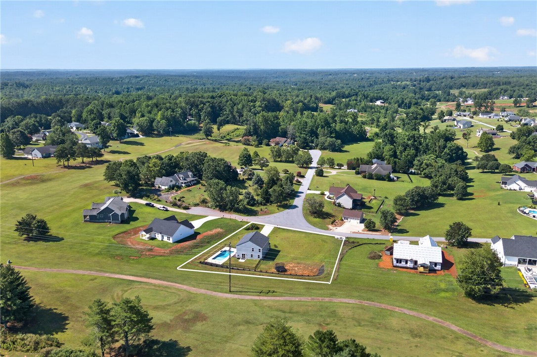 2007 Aberdeen Lane Walhalla, SC 29691 - Photo 35 of 41 An aerial perspective reveals a charming residential neighborhood set against a verdant, expansive landscape with mature trees.