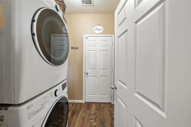 a bathroom with a sink a mirror and a shower