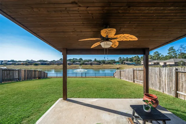 a view of a backyard with sitting area