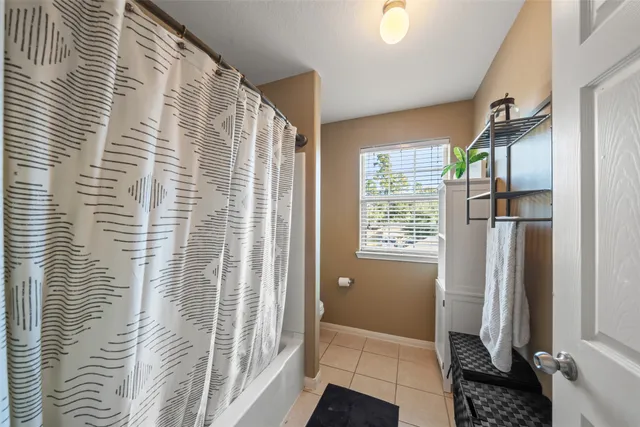 a bathroom with a sink a mirror and a toilet
