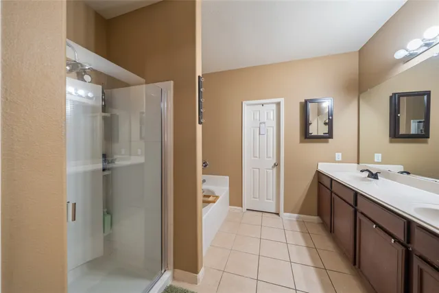 a bathroom with a sink a toilet and view