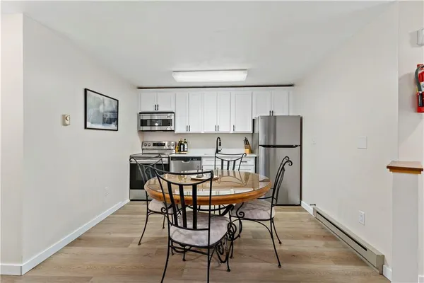 a view of a dining room with furniture