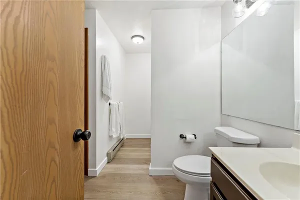 a bathroom with a sink and toilet