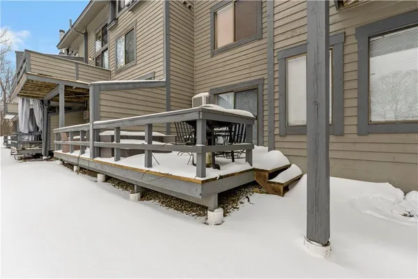 a view of a chairs and tables in the patio