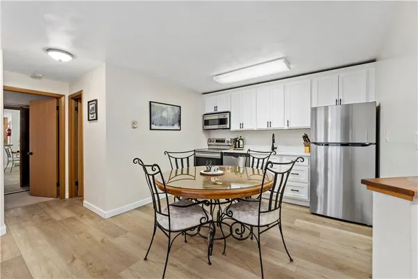 a view of a dining room with furniture