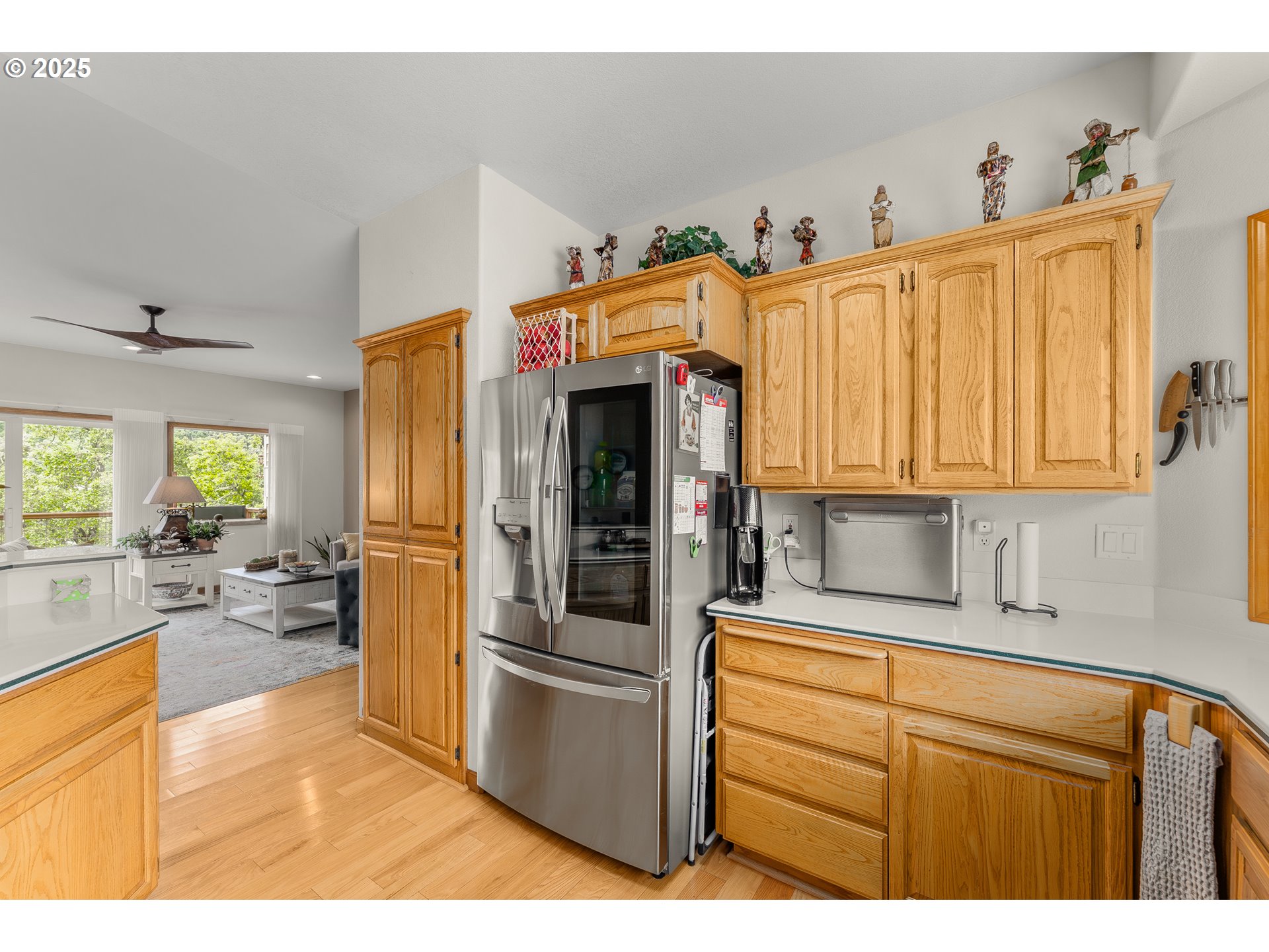 371 Rachel Lynn Way Roseburg, OR 97471 - Photo 11 of 34 a kitchen with stainless steel appliances granite countertop a refrigerator a stove and a sink with cabinets