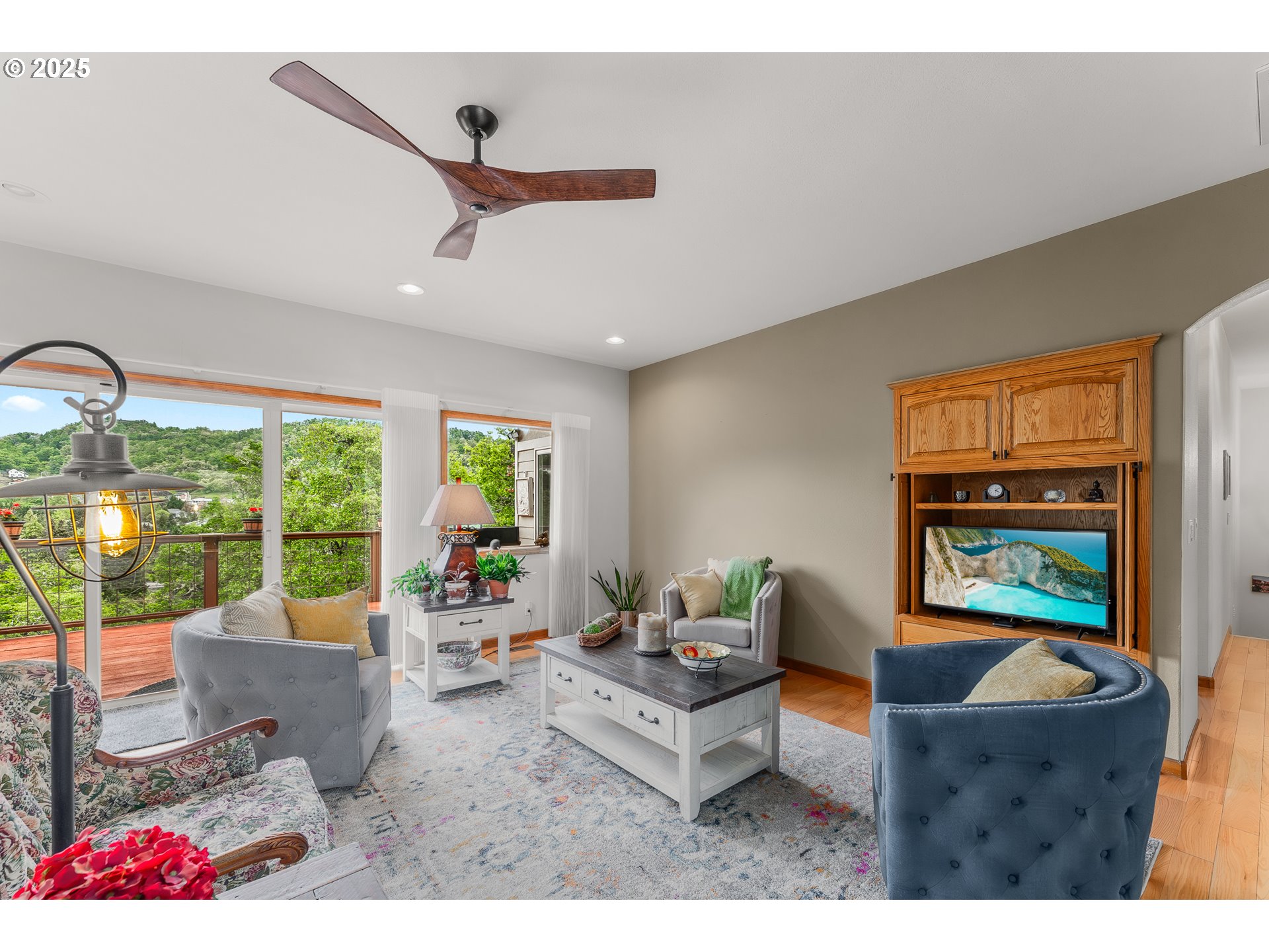 371 Rachel Lynn Way Roseburg, OR 97471 - Photo 12 of 34 a living room with furniture and a floor to ceiling window