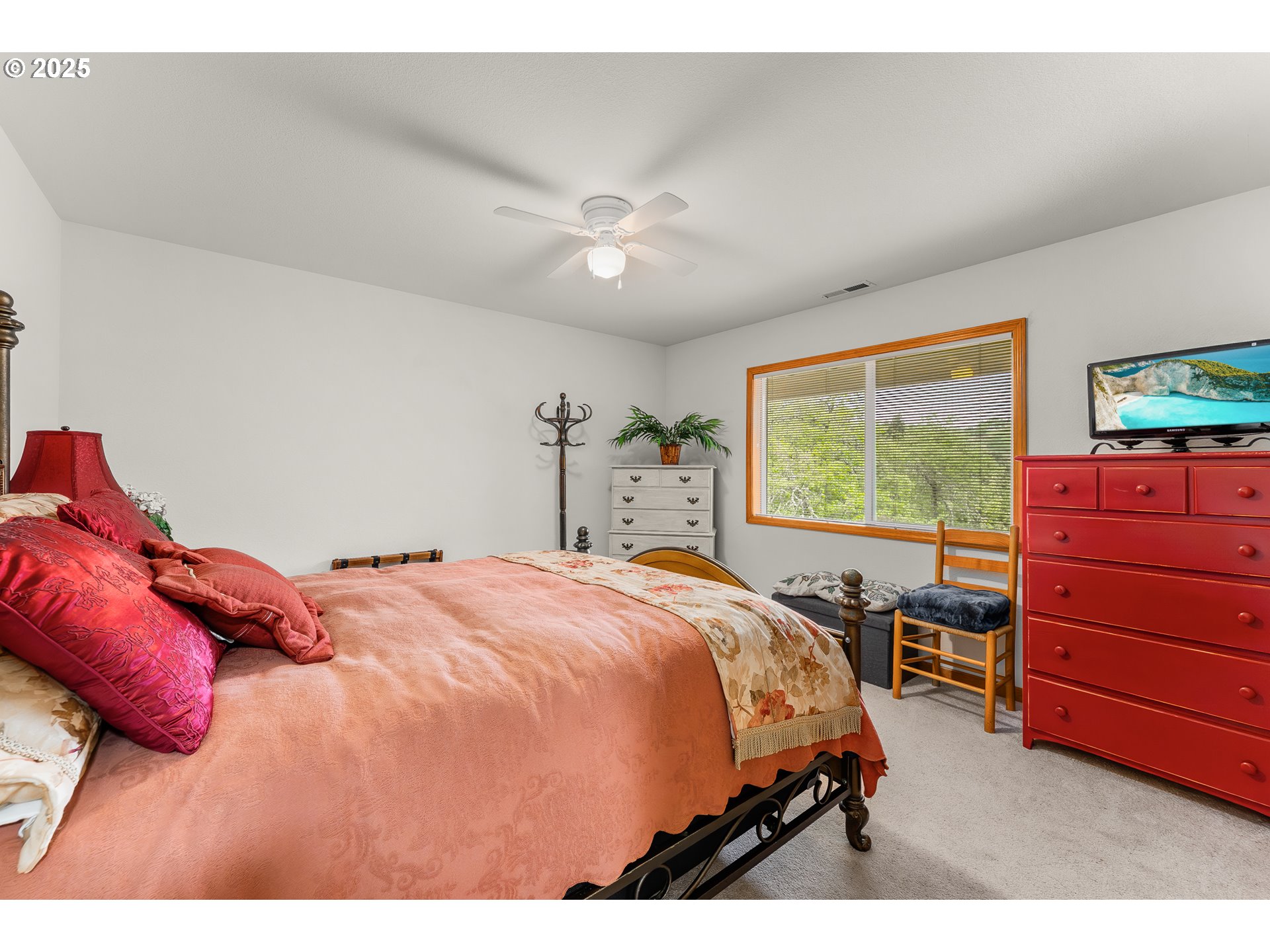 371 Rachel Lynn Way Roseburg, OR 97471 - Photo 28 of 34 a bed sitting in a bedroom next to a window