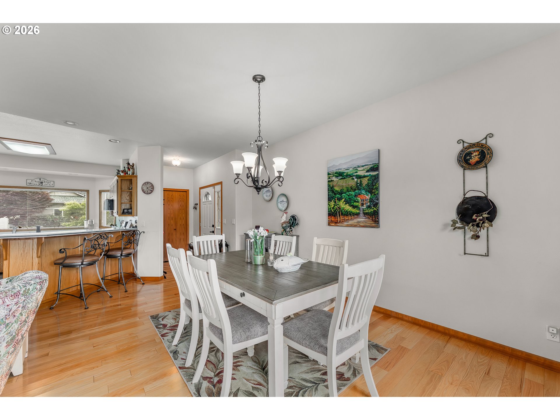 371 Rachel Lynn Way Roseburg, OR 97471 - Photo 7 of 34 a view of a dining room with furniture and wooden floor