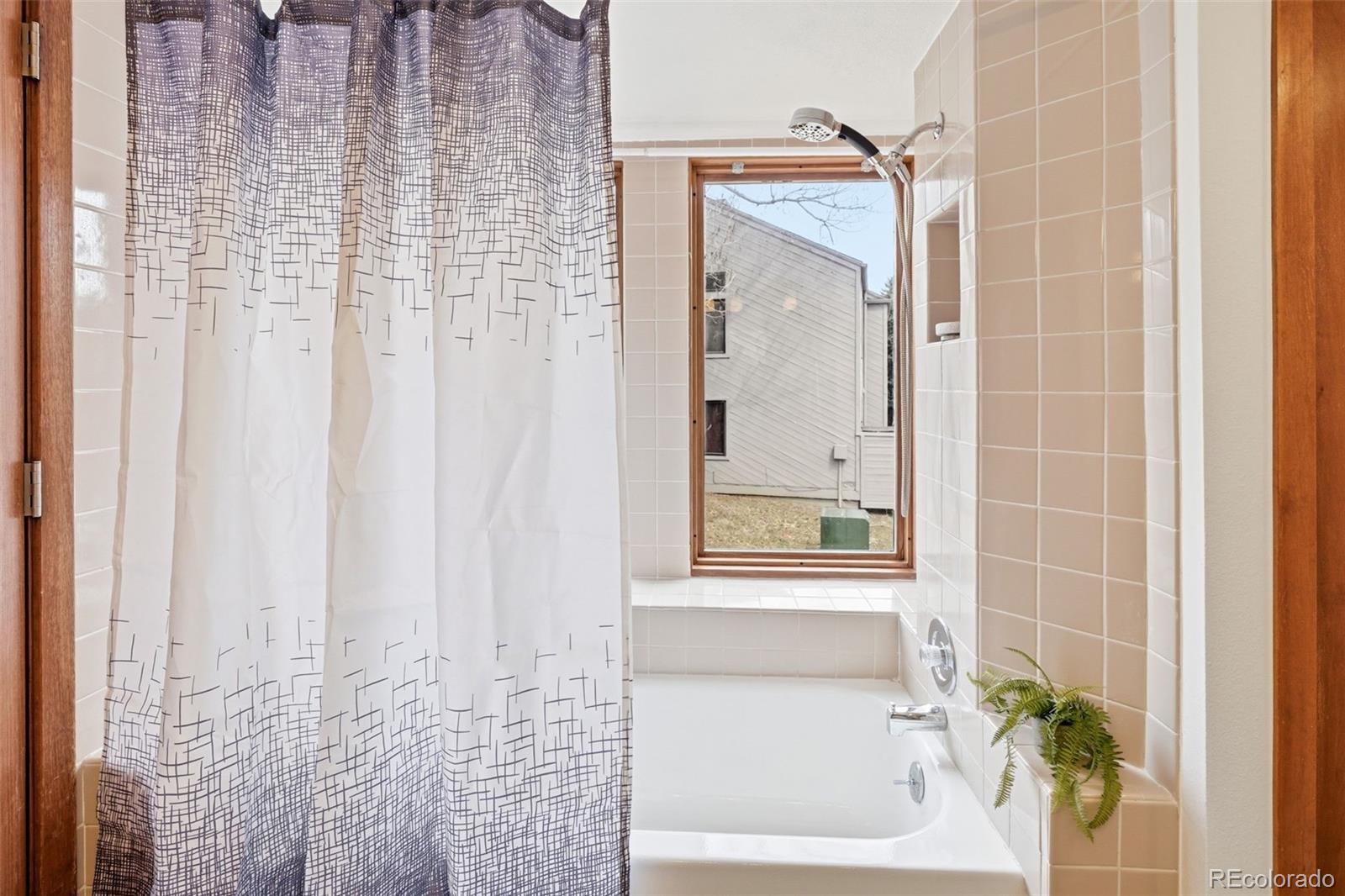 23557 Genesee Village Road, Unit A Golden, CO 80401 - Photo 23 of 38 a bathroom with a shower