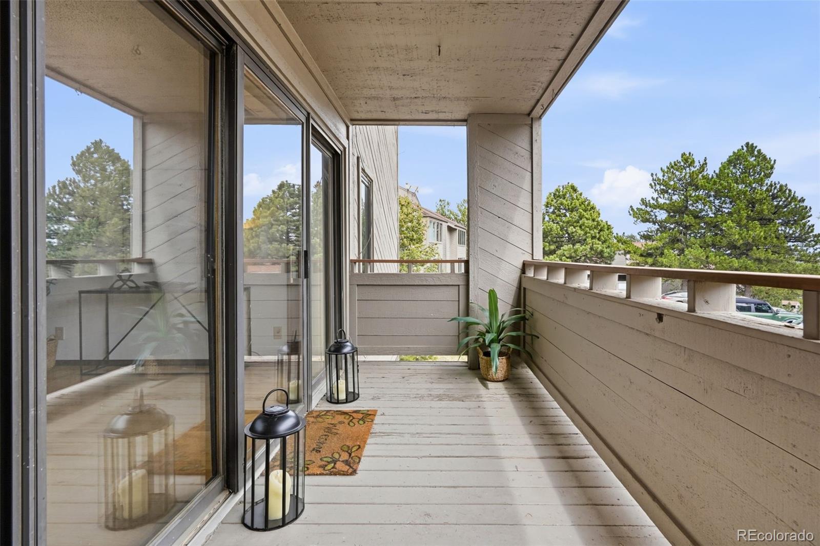 23557 Genesee Village Road, Unit A Golden, CO 80401 - Photo 25 of 38 a view of a balcony with chairs