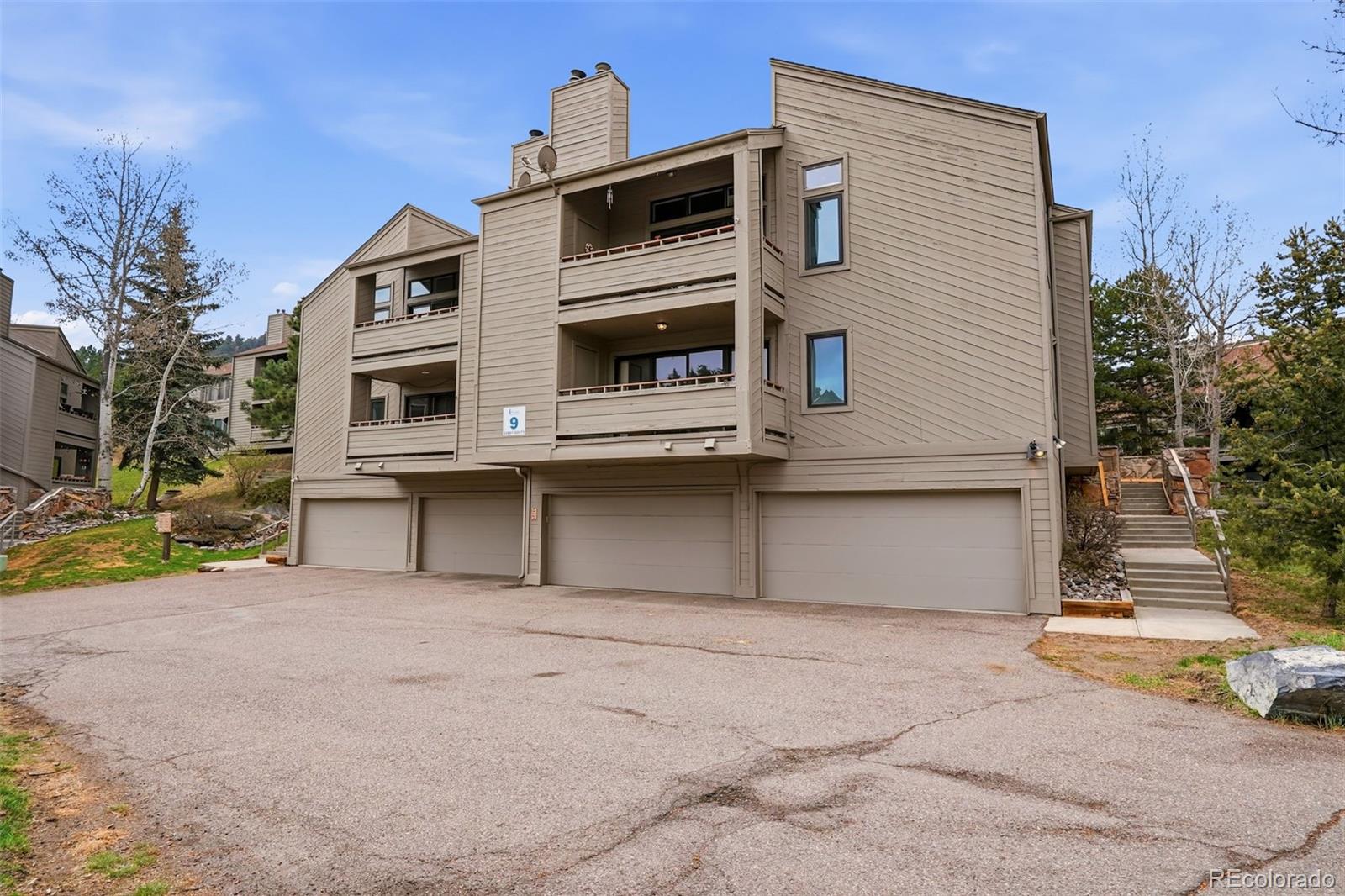 23557 Genesee Village Road, Unit A Golden, CO 80401 - Photo 27 of 38 a house view with a outdoor space