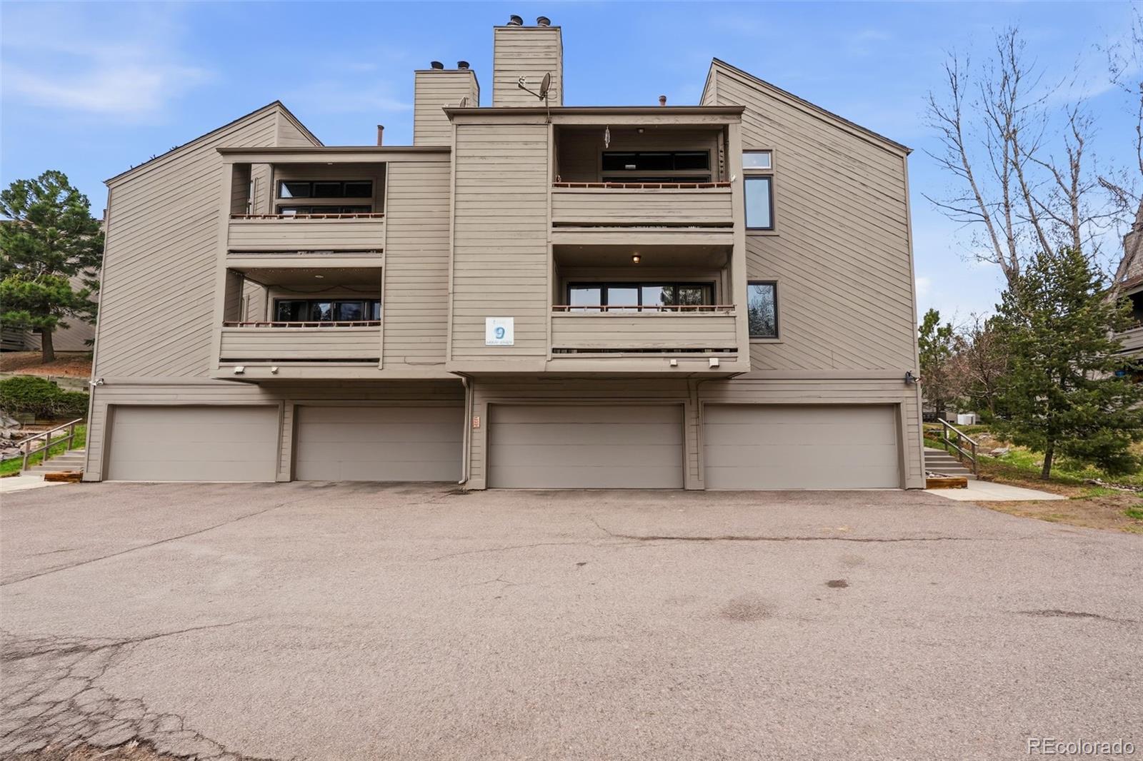 23557 Genesee Village Road, Unit A Golden, CO 80401 - Photo 28 of 38 a utility room with stainless steel appliances and cabinets