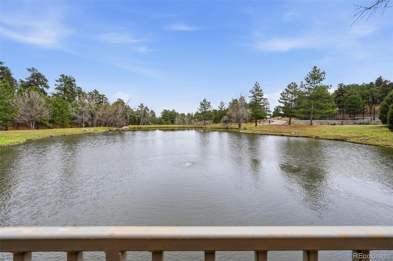 23557 Genesee Village Road, Unit A Golden, CO 80401 - Photo 37 of 38 a view of a lake with outdoor space