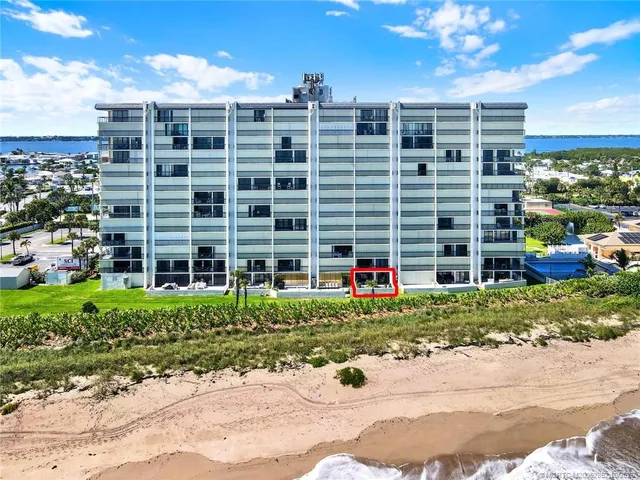 a view of a city with an ocean view