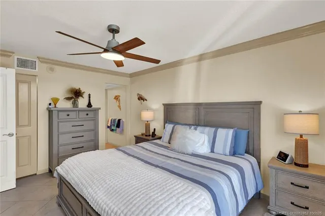 a view of living room kitchen with furniture and wooden floor