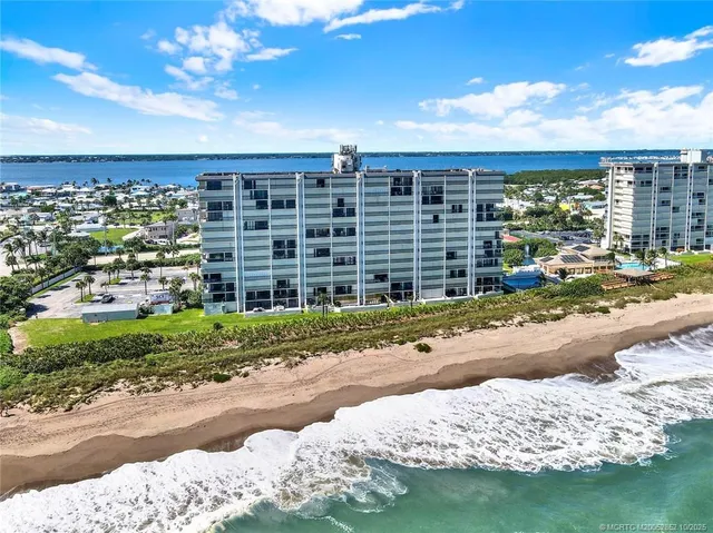 a kitchen with stainless steel appliances granite countertop a stove and a microwave