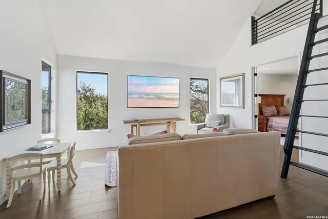 a view of a livingroom with wooden floor