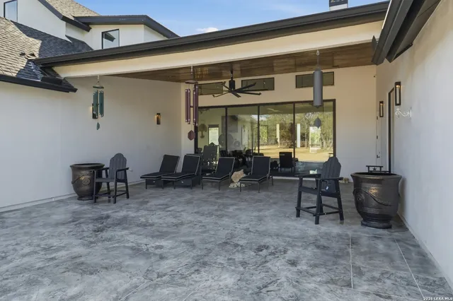 a view of a swimming pool with a patio