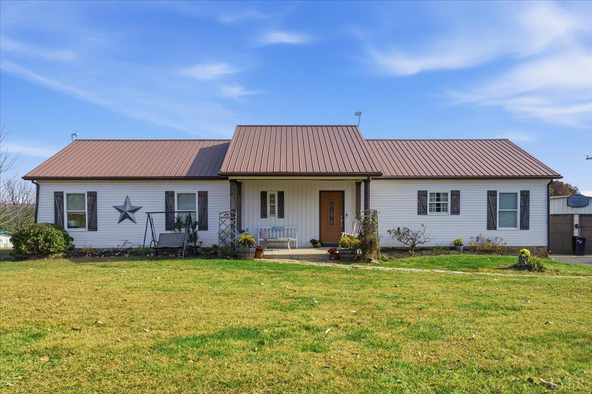 1618 Quaker Church Road Bedford, VA 24523 - Photo 1 of 50 a front view of a house with a yard
