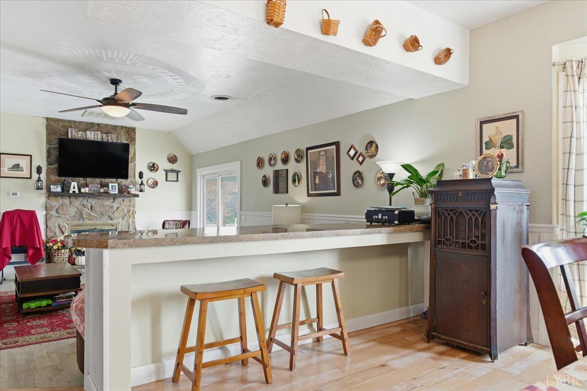 1618 Quaker Church Road Bedford, VA 24523 - Photo 17 of 50 a kitchen with a table and chairs in it