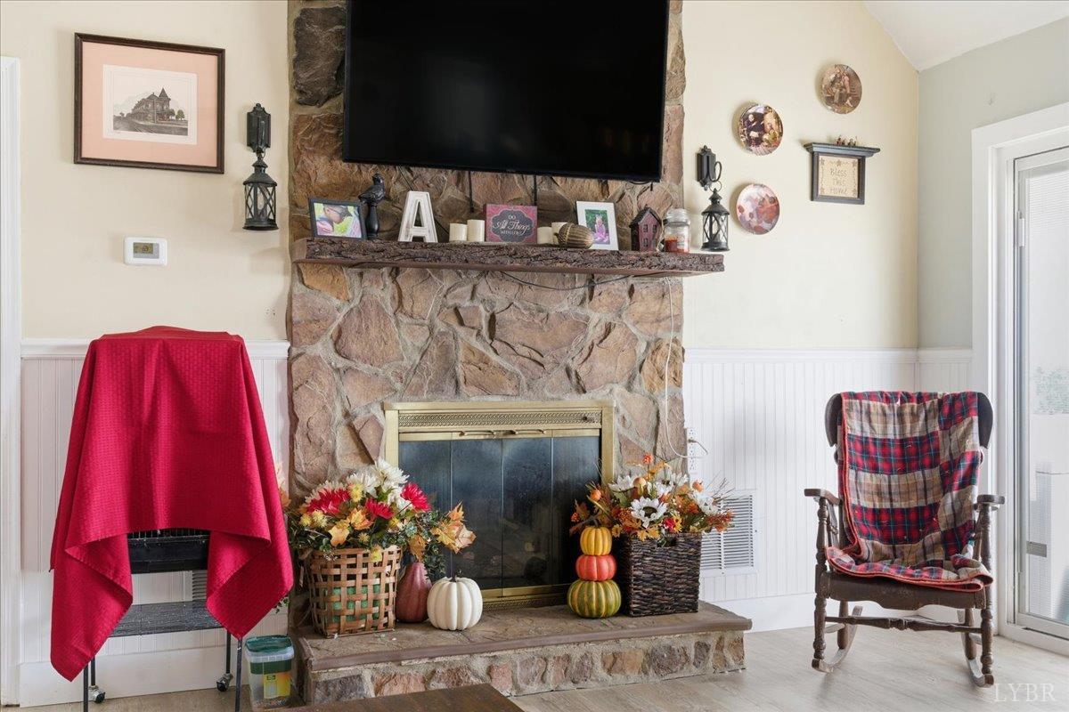 1618 Quaker Church Road Bedford, VA 24523 - Photo 19 of 50 a living room with furniture and a fireplace