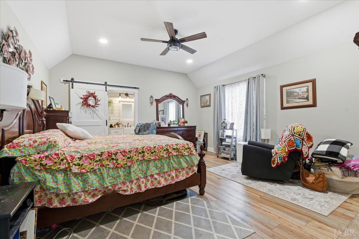 1618 Quaker Church Road Bedford, VA 24523 - Photo 22 of 50 a bedroom with a bed and a table