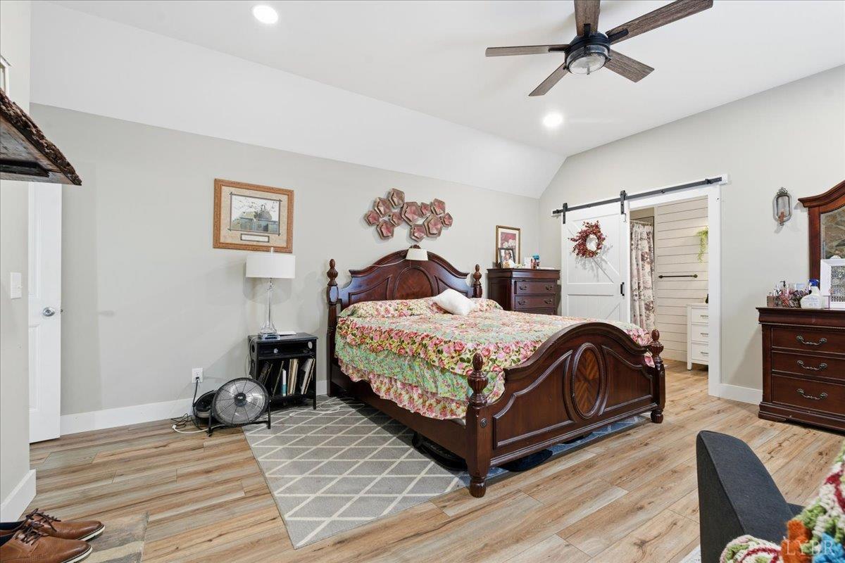 1618 Quaker Church Road Bedford, VA 24523 - Photo 23 of 50 a bedroom with a bed wooden floor and window